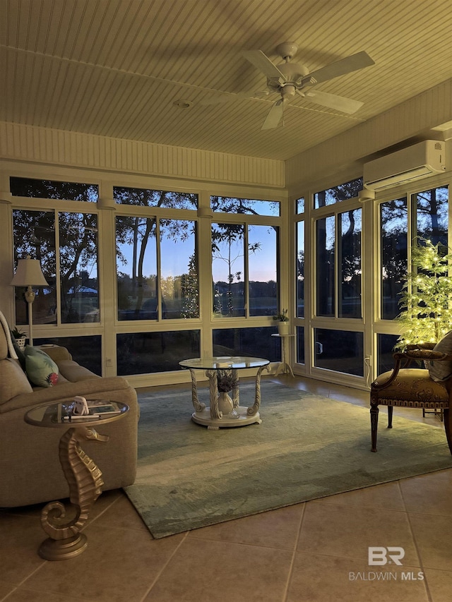 sunroom / solarium featuring a ceiling fan and a wall mounted AC