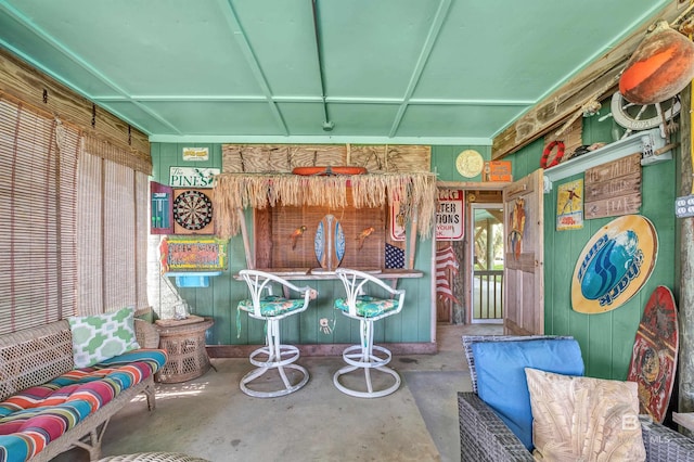 14752 State Highway 180, Gulf Shores, AL 36542 - miscellaneous room featuring concrete flooring and wood walls