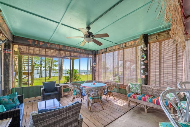 14752 State Highway 180, Gulf Shores, AL 36542 - sunroom featuring a ceiling fan, an outdoor hangout area, outdoor dining area, and a water view