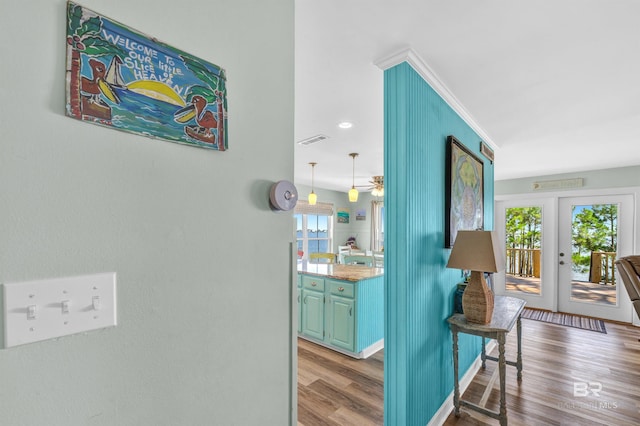 14752 State Highway 180, Gulf Shores, AL 36542 - hall with wood finished floors, ornamental molding, and french doors