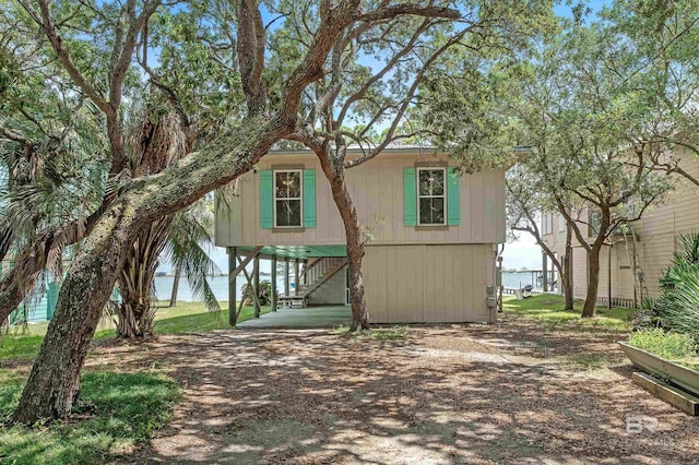 14752 State Highway 180, Gulf Shores, AL 36542 - view of front of property with a carport and stairway