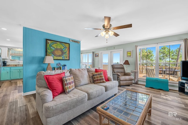 14752 State Highway 180, Gulf Shores, AL 36542 - living area featuring a ceiling fan, plenty of natural light, wood finished floors, and recessed lighting