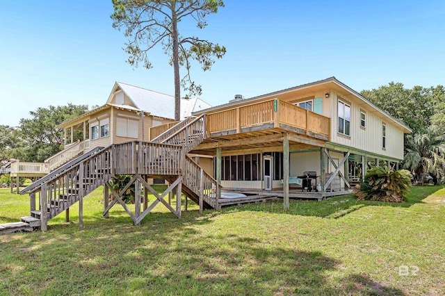 14752 State Highway 180, Gulf Shores, AL 36542 - back of property featuring stairs, a deck, and a yard