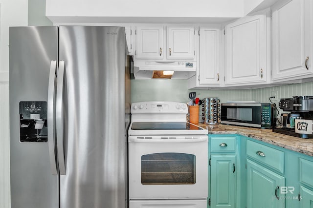 14752 State Highway 180, Gulf Shores, AL 36542 - kitchen with appliances with stainless steel finishes, under cabinet range hood, white cabinets, and light stone counters