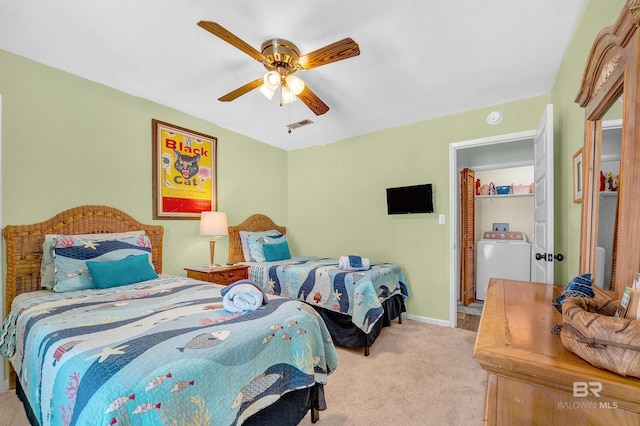 14752 State Highway 180, Gulf Shores, AL 36542 - carpeted bedroom featuring washer / dryer and a ceiling fan