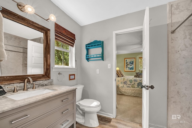 14752 State Highway 180, Gulf Shores, AL 36542 - ensuite bathroom with vanity and wood finished floors