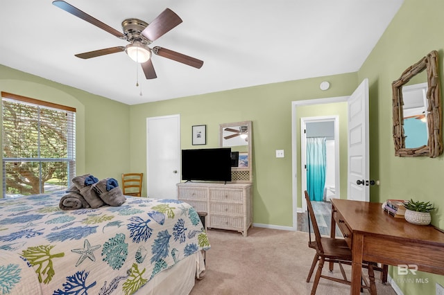 14752 State Highway 180, Gulf Shores, AL 36542 - bedroom featuring light colored carpet and ceiling fan