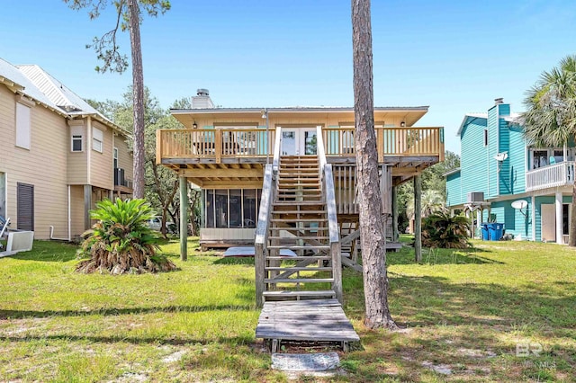 14752 State Highway 180, Gulf Shores, AL 36542 - back of house featuring stairway, a wooden deck, a yard, and a chimney