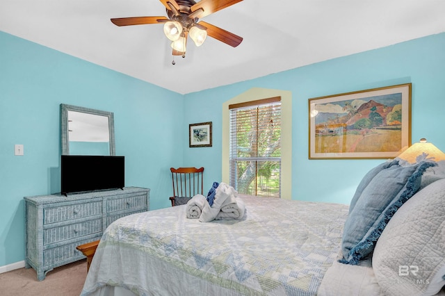 14752 State Highway 180, Gulf Shores, AL 36542 - carpeted bedroom with a ceiling fan and baseboards