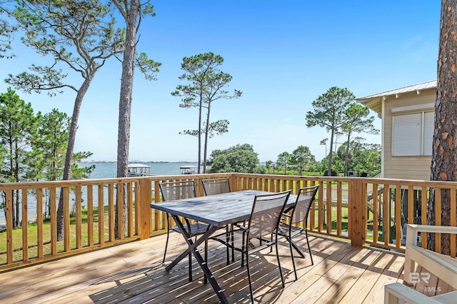 14752 State Highway 180, Gulf Shores, AL 36542 - wooden deck with a water view and outdoor dining space