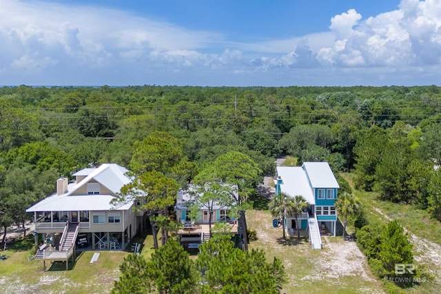 14752 State Highway 180, Gulf Shores, AL 36542 - view from above of property with a forest