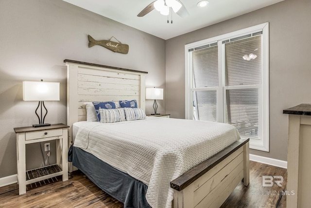 bedroom featuring dark wood-type flooring and ceiling fan