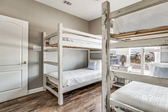 bedroom featuring dark hardwood / wood-style floors