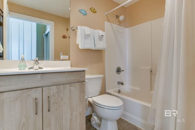 full bathroom with tile patterned flooring, vanity, toilet, and shower / bath combo with shower curtain