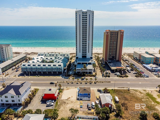 aerial view featuring a water view and a view of the beach