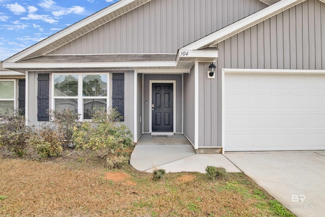 property entrance with a garage