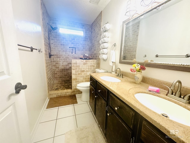 513 3rd St, Fairhope, AL 36532 - bathroom with tile patterned flooring, double vanity, and tiled shower