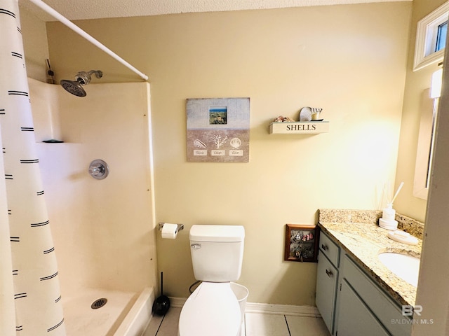513 3rd St, Fairhope, AL 36532 - full bath featuring tile patterned flooring, vanity, and curtained shower