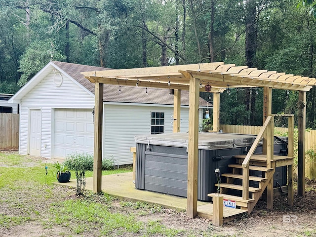 513 3rd St, Fairhope, AL 36532 - view of outdoor structure with a hot tub and a pergola