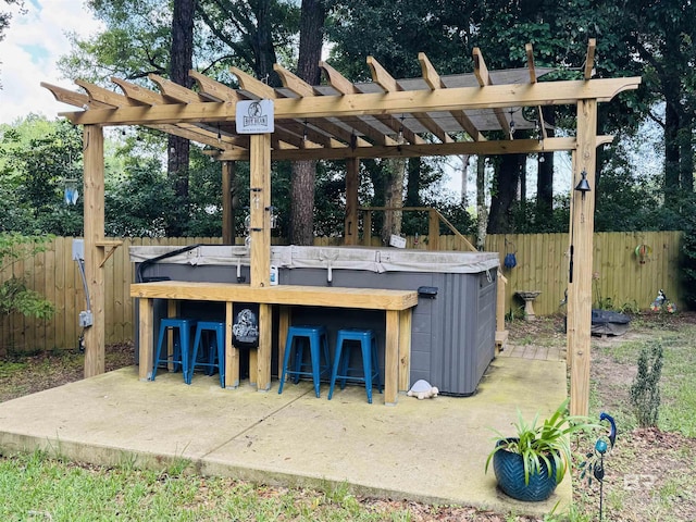 513 3rd St, Fairhope, AL 36532 - view of patio with view of wooded area and a pergola