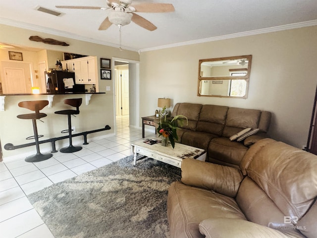 513 3rd St, Fairhope, AL 36532 - living area featuring a ceiling fan, light tile patterned floors, and ornamental molding