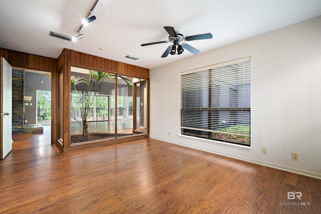 6 Pirates Ln, Spanish Fort, AL 36527 - empty room with track lighting, wood finished floors, and ceiling fan