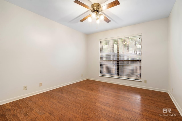 6 Pirates Ln, Spanish Fort, AL 36527 - empty room featuring ceiling fan and wood finished floors