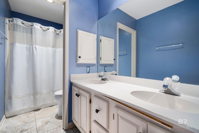 6 Pirates Ln, Spanish Fort, AL 36527 - bathroom featuring double vanity and curtained shower