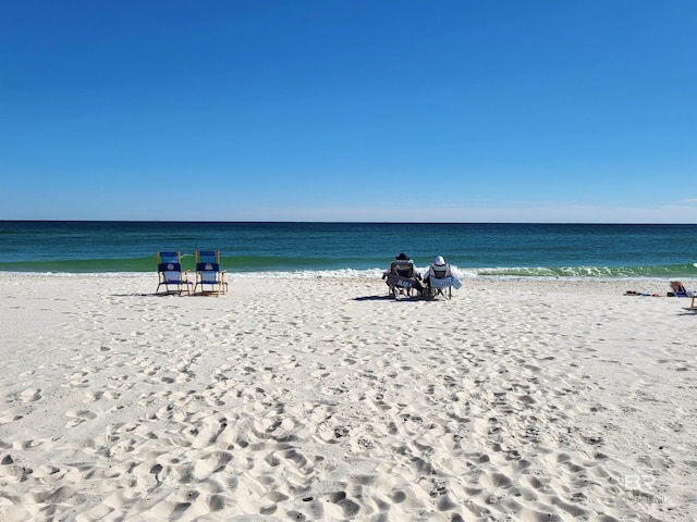 property view of water featuring a view of the beach