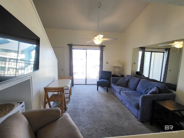 living room with ceiling fan, high vaulted ceiling, and carpet floors