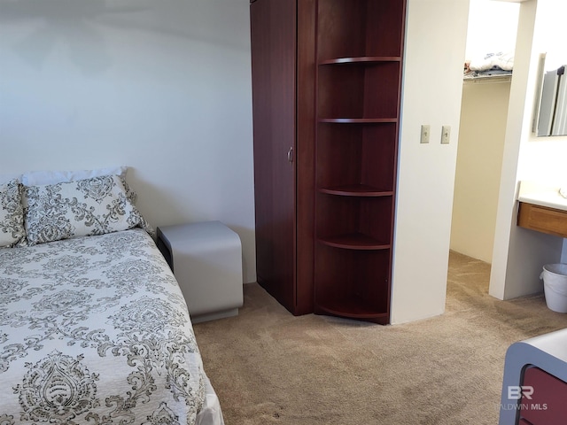 bedroom featuring light carpet