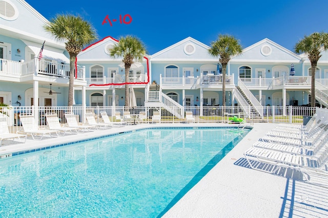 view of swimming pool with a patio area