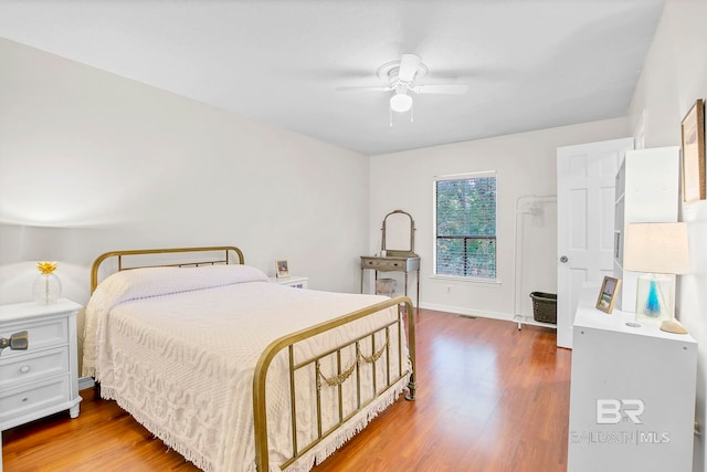 651 Olive Ave, Fairhope, AL 36532 - bedroom featuring wood finished floors and a ceiling fan