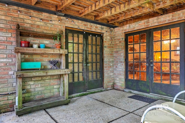 651 Olive Ave, Fairhope, AL 36532 - entrance to property featuring french doors and brick siding