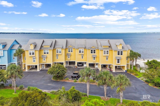 view of building exterior with a water view