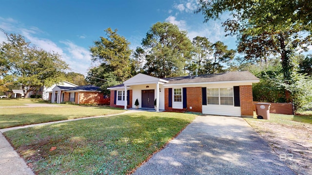 ranch-style house with a front yard