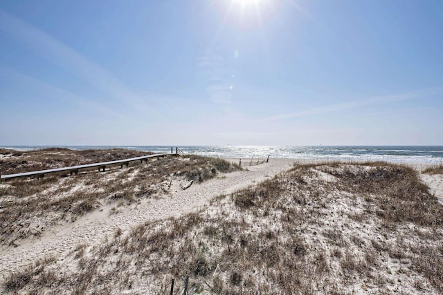 property view of water featuring a view of the beach