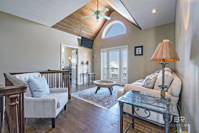 living room with dark wood-style floors, ceiling fan, high vaulted ceiling, and recessed lighting