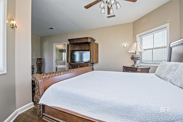 bedroom featuring dark wood-style flooring, visible vents, ceiling fan, and baseboards