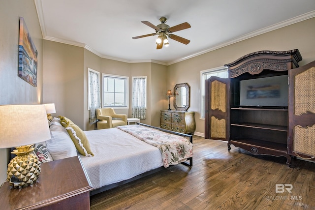 bedroom featuring ceiling fan, baseboards, dark wood finished floors, and crown molding