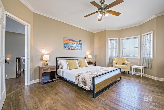 bedroom featuring dark wood-type flooring, crown molding, baseboards, and a ceiling fan