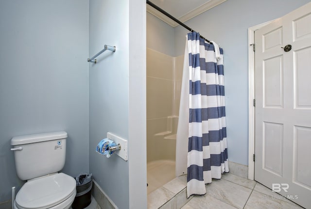 full bath with a stall shower, tile patterned flooring, toilet, and crown molding