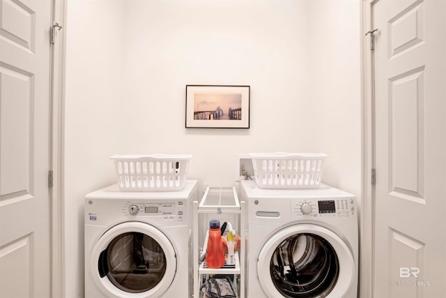 washroom featuring independent washer and dryer