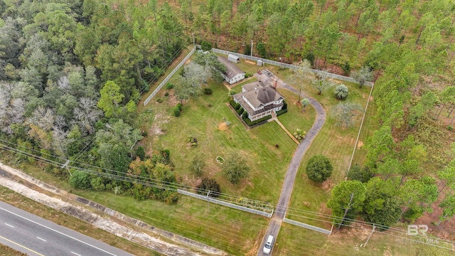 bird's eye view featuring a wooded view