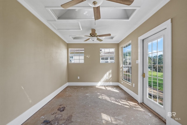 spare room featuring crown molding, baseboards, and ceiling fan