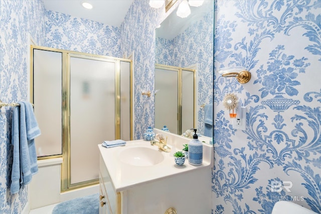 bathroom featuring vanity and walk in shower