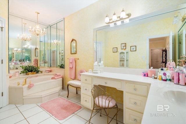 bathroom featuring tile patterned flooring, vanity, a tub to relax in, and a chandelier