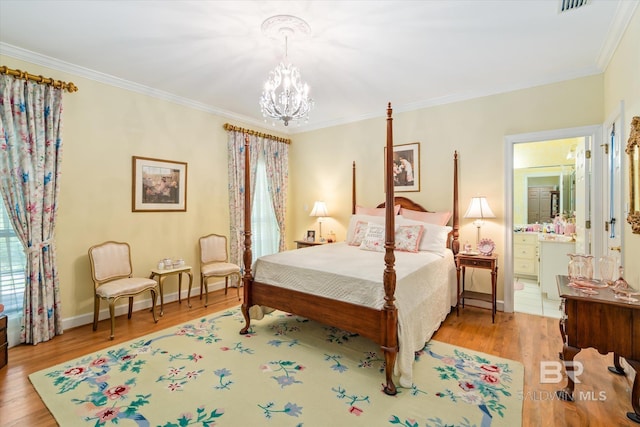 bedroom with light wood-type flooring, an inviting chandelier, ensuite bath, and ornamental molding