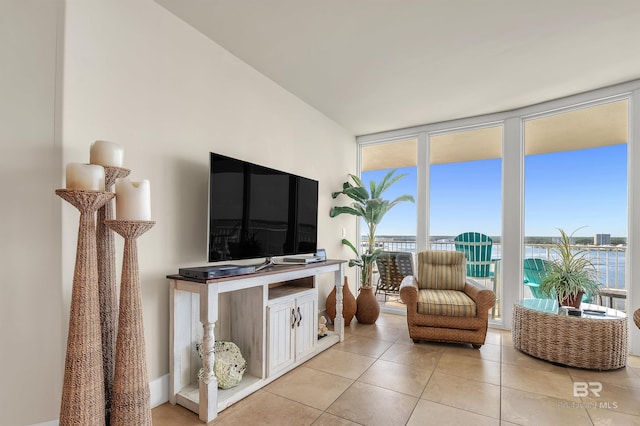 28107 Perdido Beach Blvd Unit D1005, Orange Beach, AL 36561 - living area featuring expansive windows and light tile patterned floors