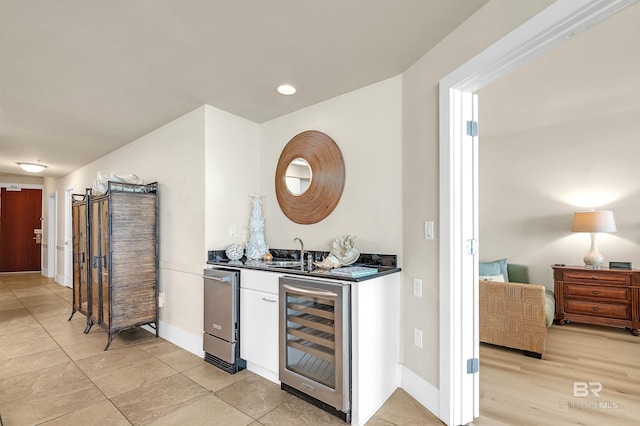 28107 Perdido Beach Blvd Unit D1005, Orange Beach, AL 36561 - indoor wet bar with beverage cooler and baseboards